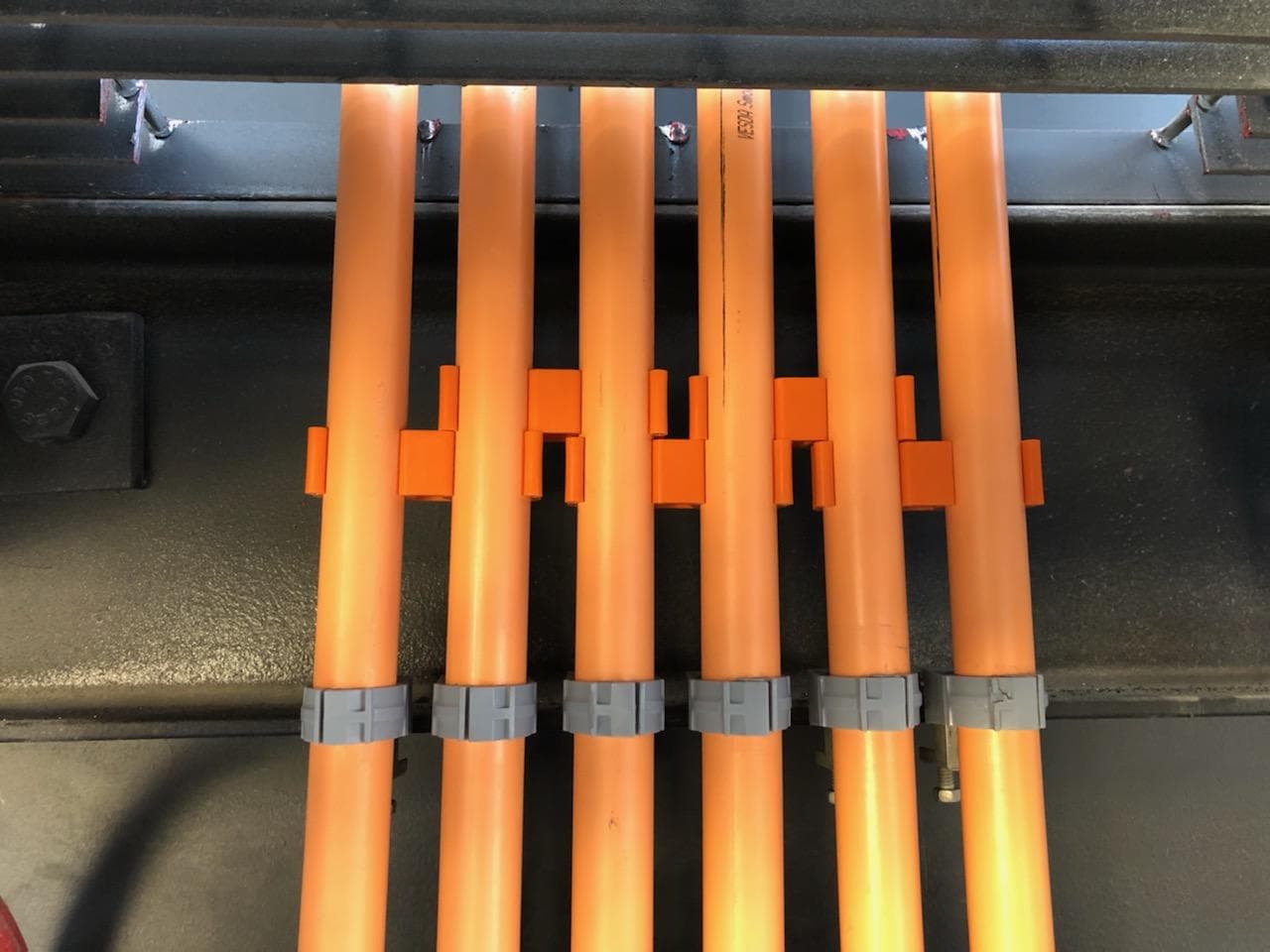 electrical pvc pipe connected and aligned with slammers conduit spacers